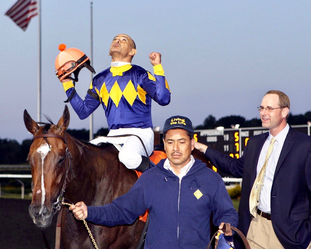 Living the Life after winning the Grade 2 Presque Isle Downs Masters Stakes, with jockey Mike Smith and trainer Gary Mandella